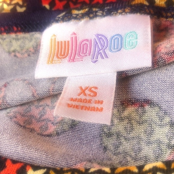 LuLaRoe Simply Comfortable Disney Mickey Mouse Head Irma Top Size X- Small NWT - Picture 10 of 13